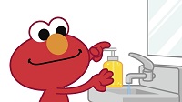 Elmo washing his hands